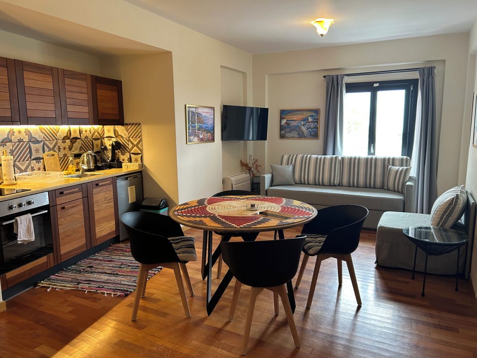 Signature Villa, Outdoor Jacuzzi, Sea View | Living area | 42-inch Smart TV with satellite channels
