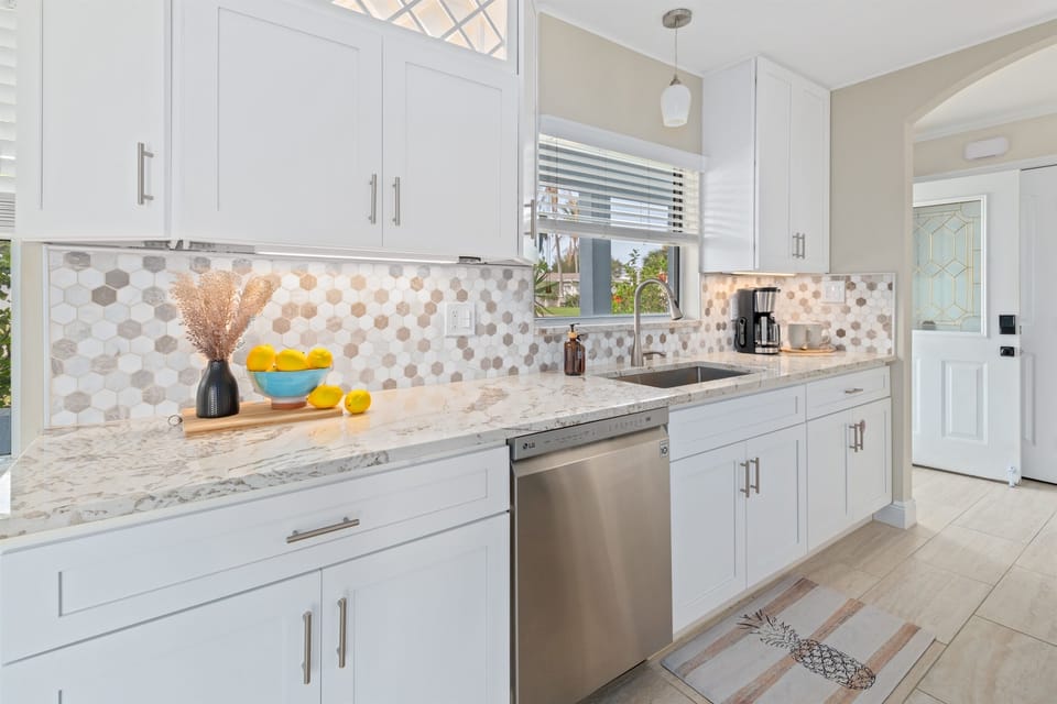 Stainless steel appliances, including dishwasher.