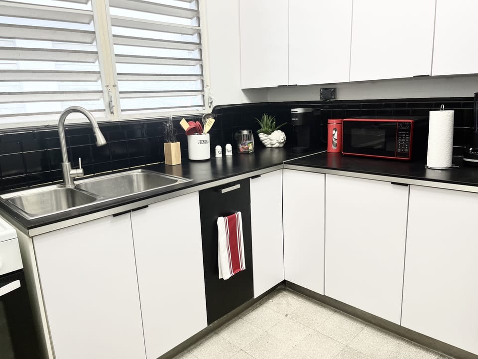 Full kitchen (no dishwasher) with blender, coffee maker, microwave and seasoning