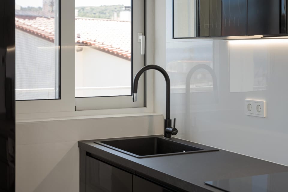 Comfort Apartment | Private kitchen | Full-size fridge, microwave, oven, stovetop