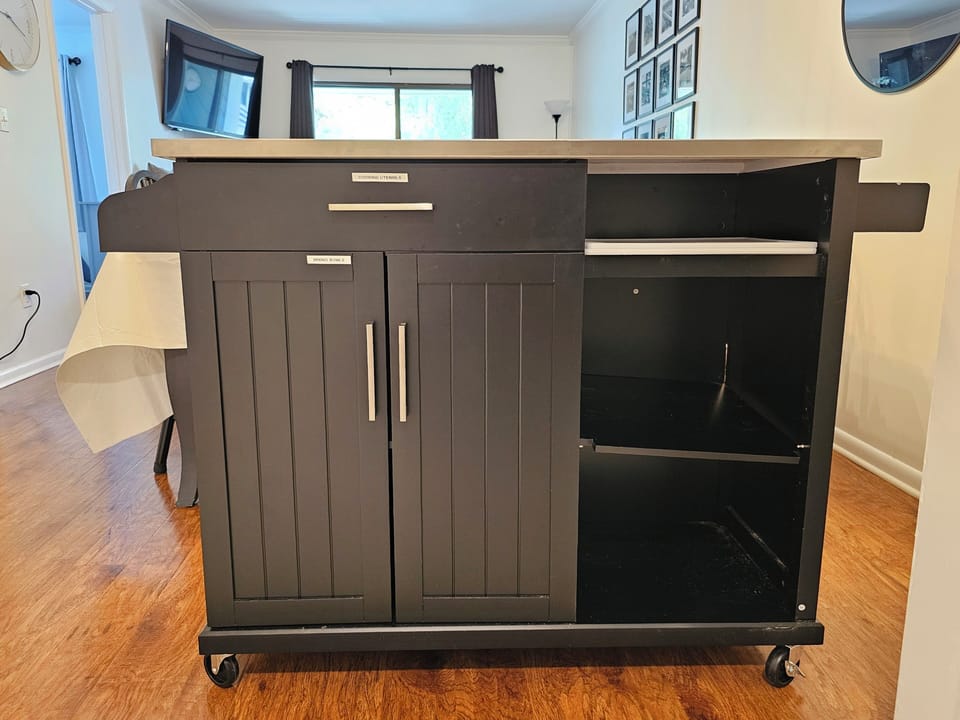 Rolling cart for extra storage and prep surface in the kitchen.