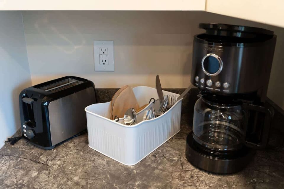 Coffee station with toaster and utensils