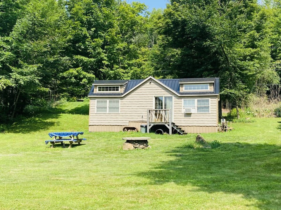 Savor stunning lake views from the porch, cozy firepit, or manicured lawn. Enjoy the ideal backdrop for relaxation and unforgettable moments.