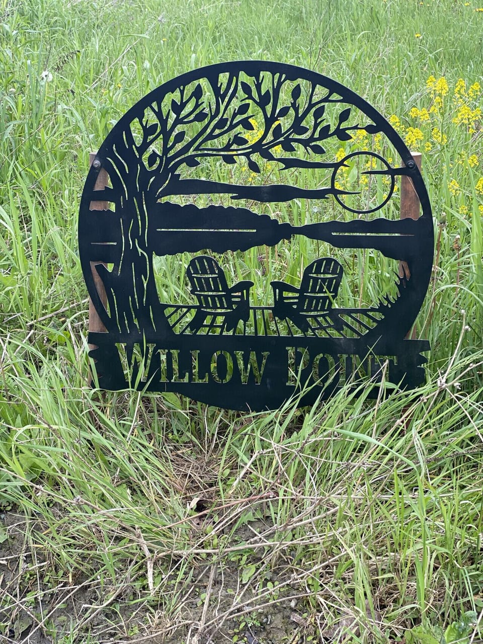 Sign to mark the entrance to the seasonal rd leading to the Lakeside Tiny cabin.