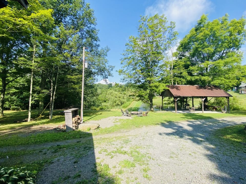 ake in stunning pond views from the porch, share stories by the firepit, stroll the scenic property, fish in the tranquil ponds, or enjoy games in the charming pavilion.