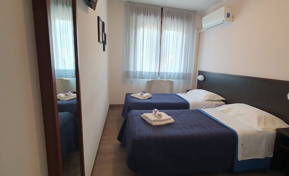 Basic Double or Twin Room | Desk, WiFi (free), bed sheets