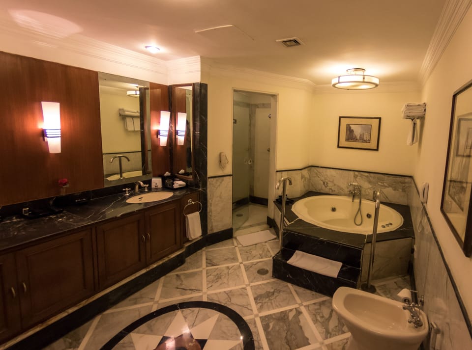 Designer toiletries, hair dryer, bathrobes, slippers