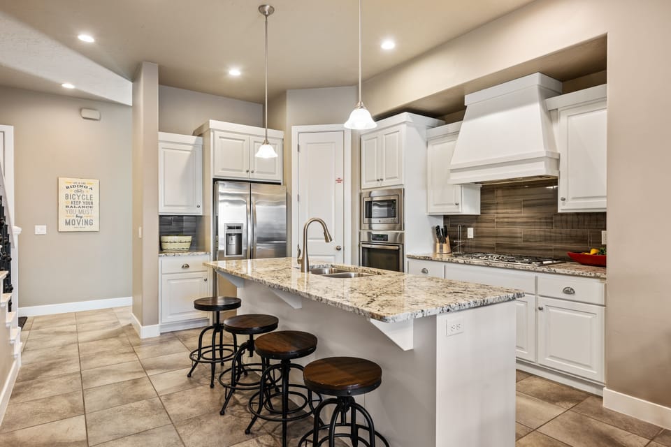 Townhome, 4 Bedrooms | Private kitchen | Coffee/tea maker, fridge, oven, toaster