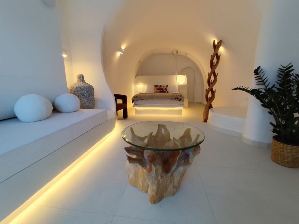 Deluxe Suite With Private Jacuzzi | Living area | 40-inch Smart TV with digital channels