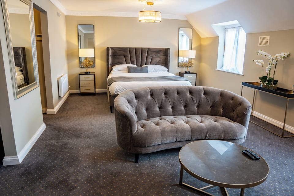 Executive Suite | Blackout drapes, soundproofing, iron/ironing board, free WiFi