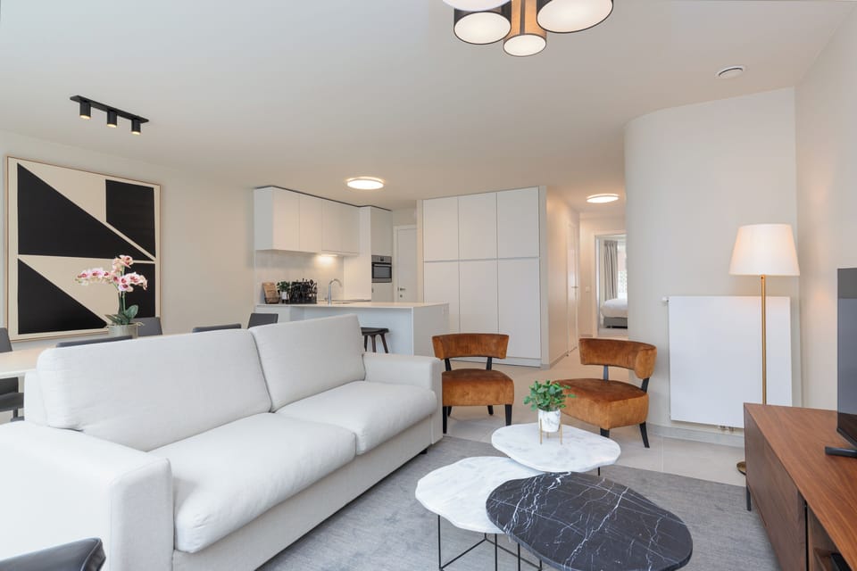 Deluxe Apartment, 2 Bedrooms, Kitchen, City View | Living area | 50-inch Smart TV with digital channels