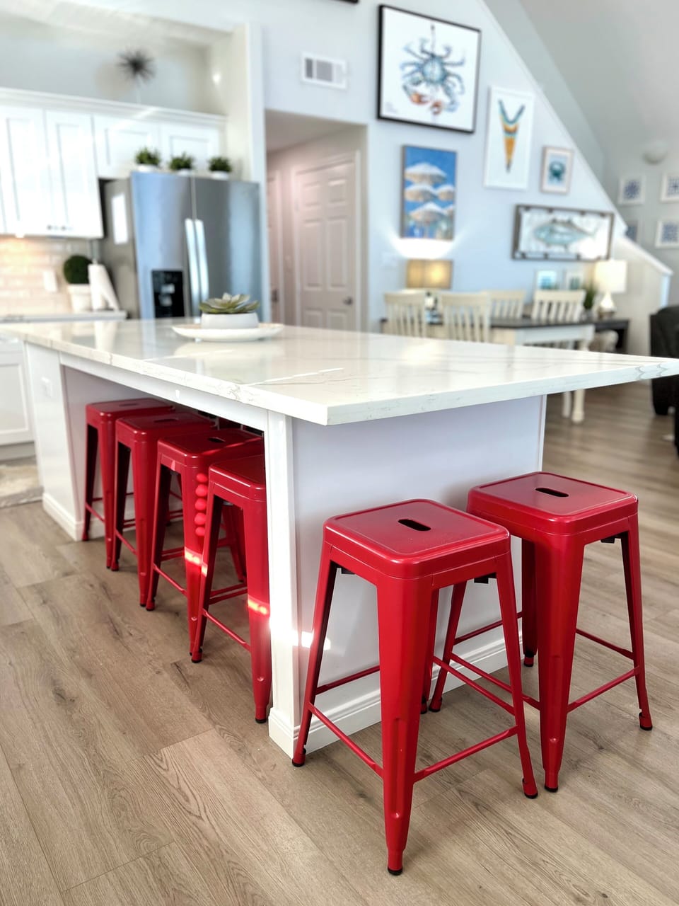 Seating for 10 at kitchen island. Dish soap, paper towels, trash bags, sponge