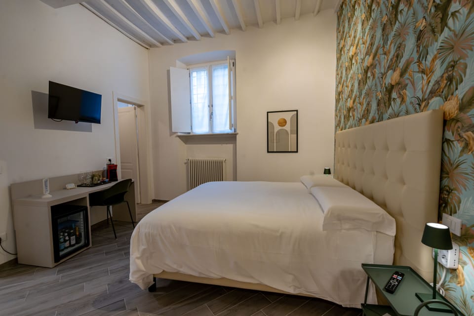 Superior Room, 1 Queen Bed, Air conditioning, Ground Floor | Minibar, in-room safe, individually decorated, individually furnished