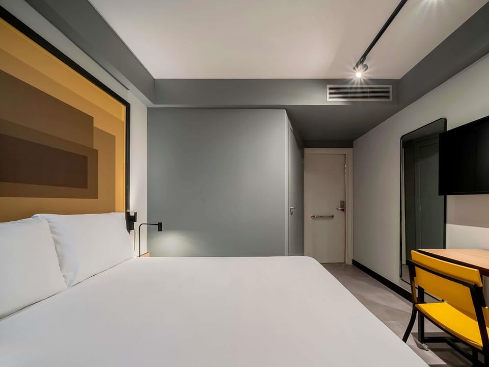 Standard Apartment, 1 Double Bed, Accessible | Minibar, in-room safe, desk, blackout drapes