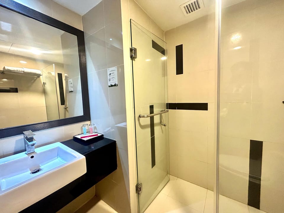 Shower, free toiletries, hair dryer, slippers