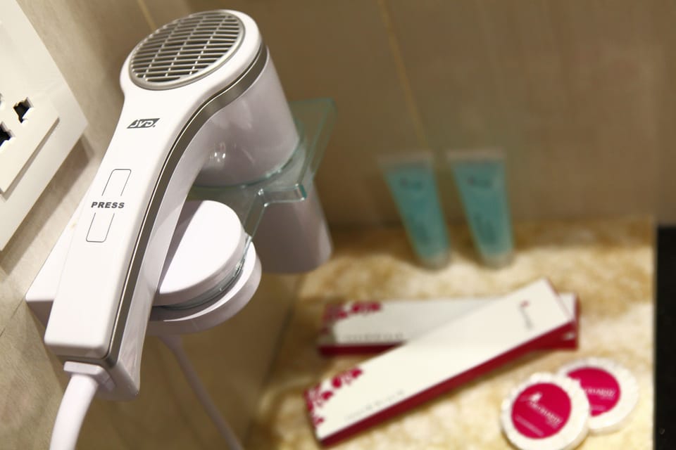 Shower, free toiletries, hair dryer, slippers