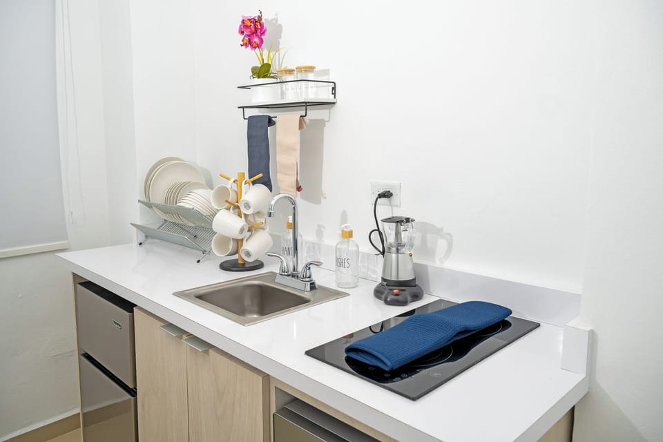 Comfort Room | Private kitchen | Coffee/tea maker, electric kettle