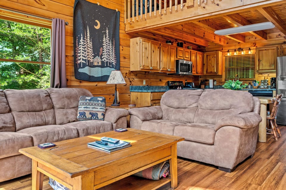 Living open to the kitchen and loft above