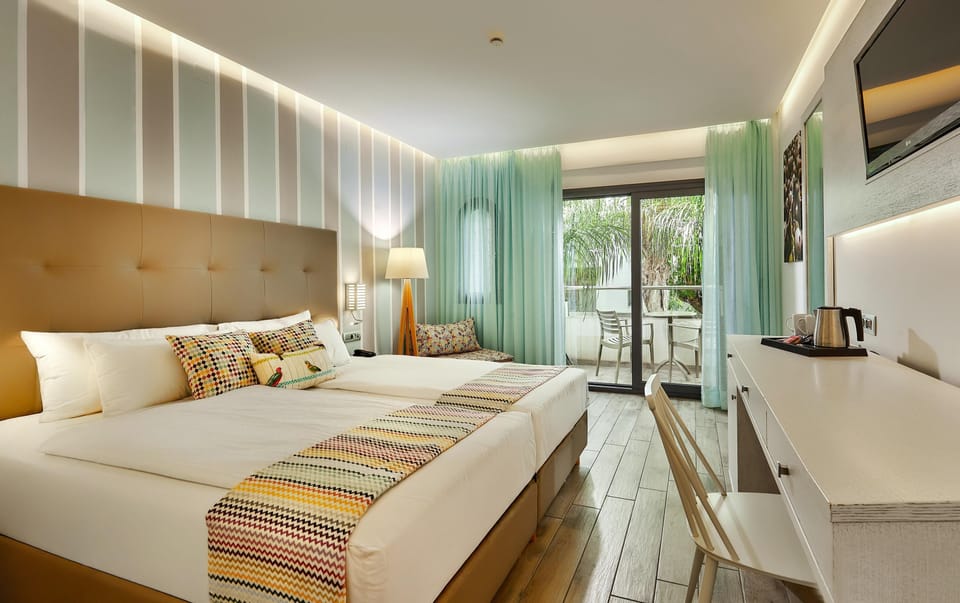 Premium bedding, memory foam beds, laptop workspace, soundproofing