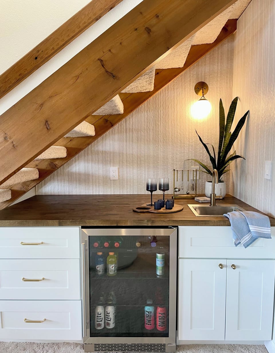 Wet bar and bar tools. Fridge holds wine and other drinks -drinks not provided