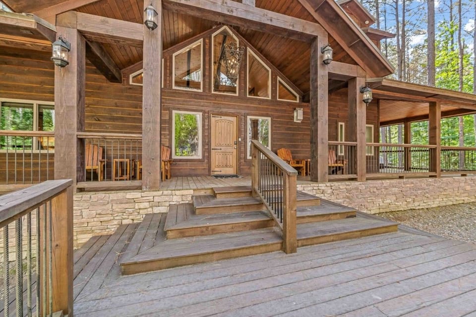 Front entrance with steps up to the covered porch.