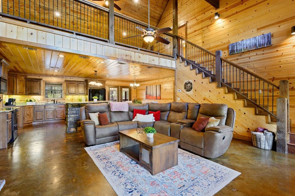 Soaring great room blends a full chef`s kitchen, breakfast bar, and oversized seating so no one gets left out of the conversation.