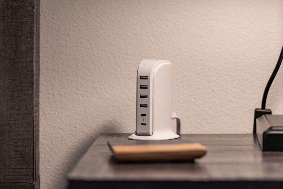 Smart charging stations in the bedrooms — never lose battery on the trail.