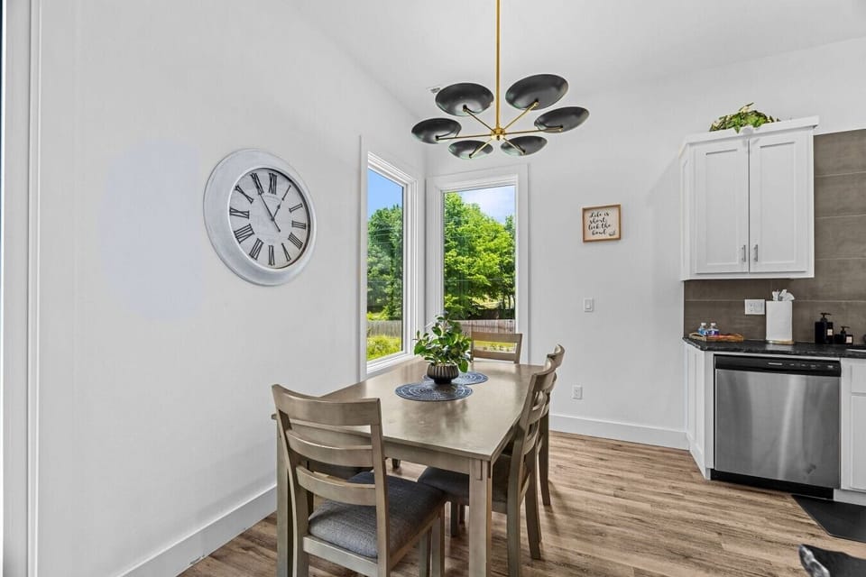 Dining for the whole group, open to the kitchen and living room.
