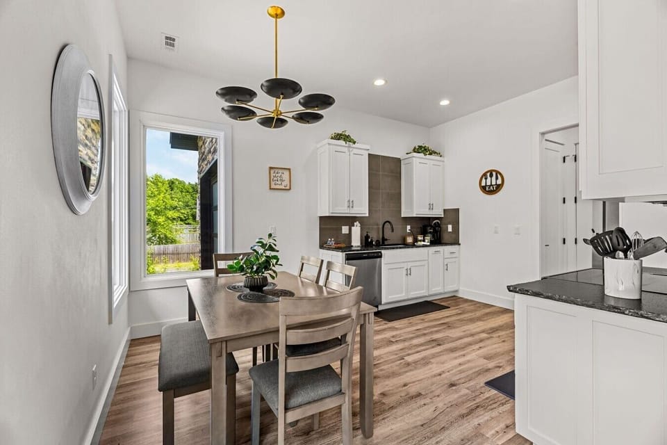 Kitchen island opens to the dining and living areas.