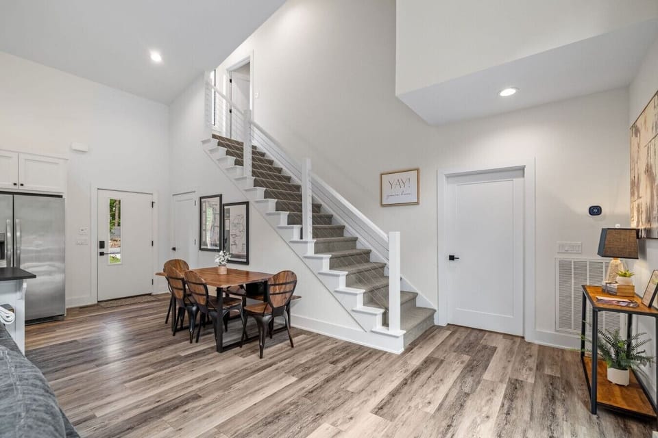Open staircase & entry — modern two-story Bella Vista chalet