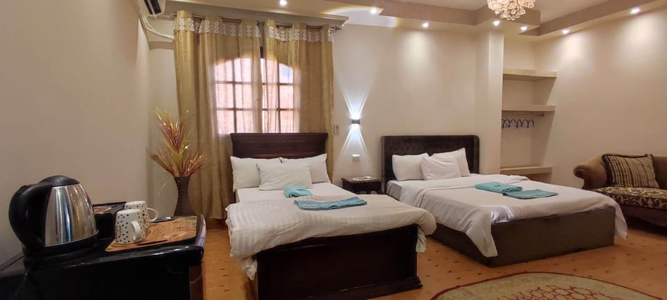 Quadruple Room | Individually decorated, individually furnished, blackout drapes