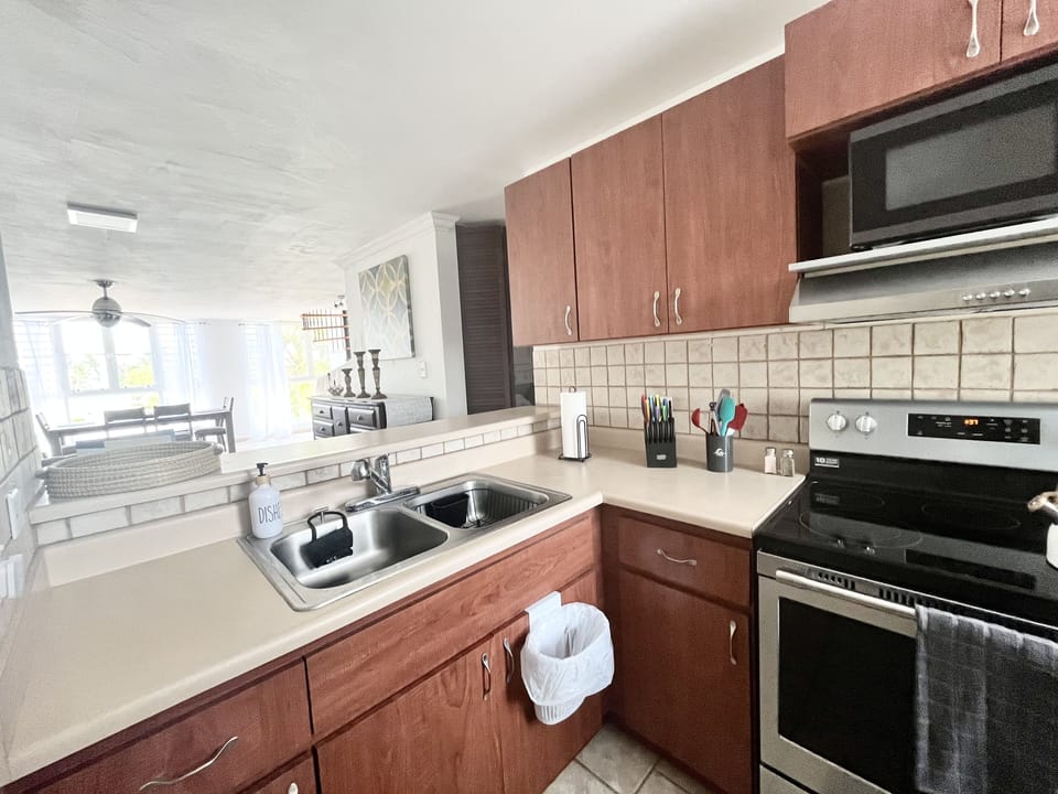 Full kitchen that is open to the living room and dining room.