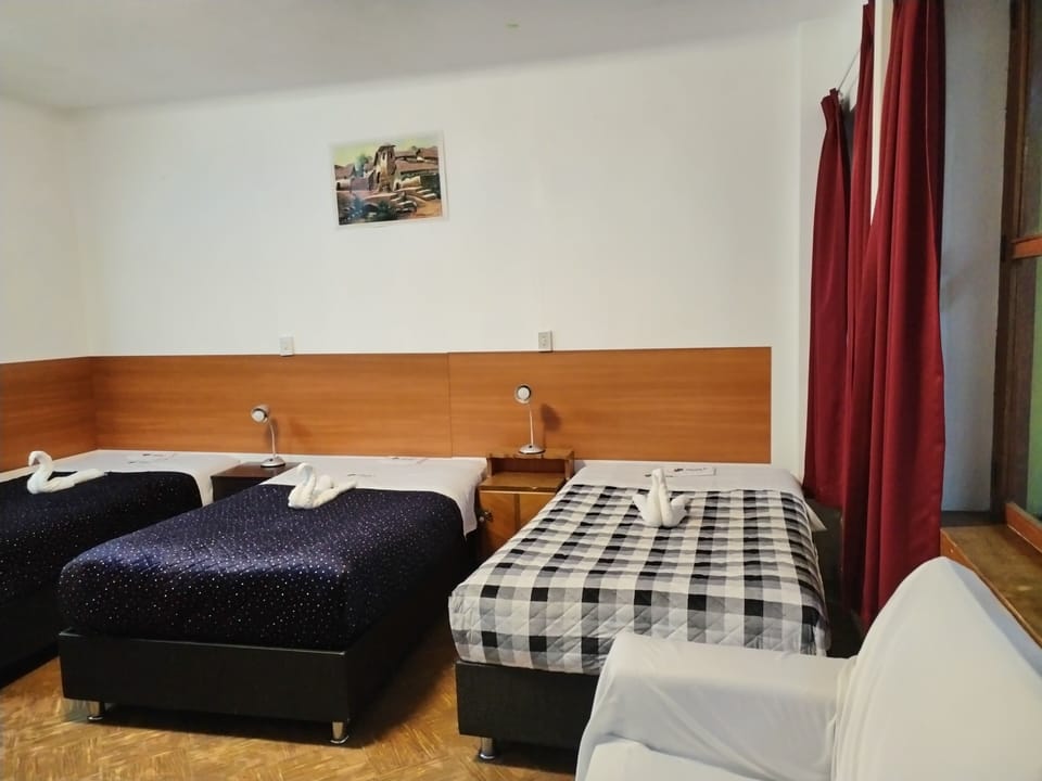 Basic Quadruple Room, Multiple Beds | Down comforters, blackout drapes, free WiFi