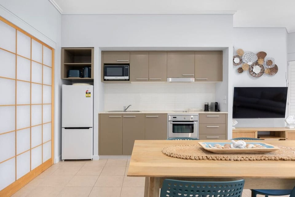 Open, airy kitchen designed for easy meal prep, family cooking, and long stays