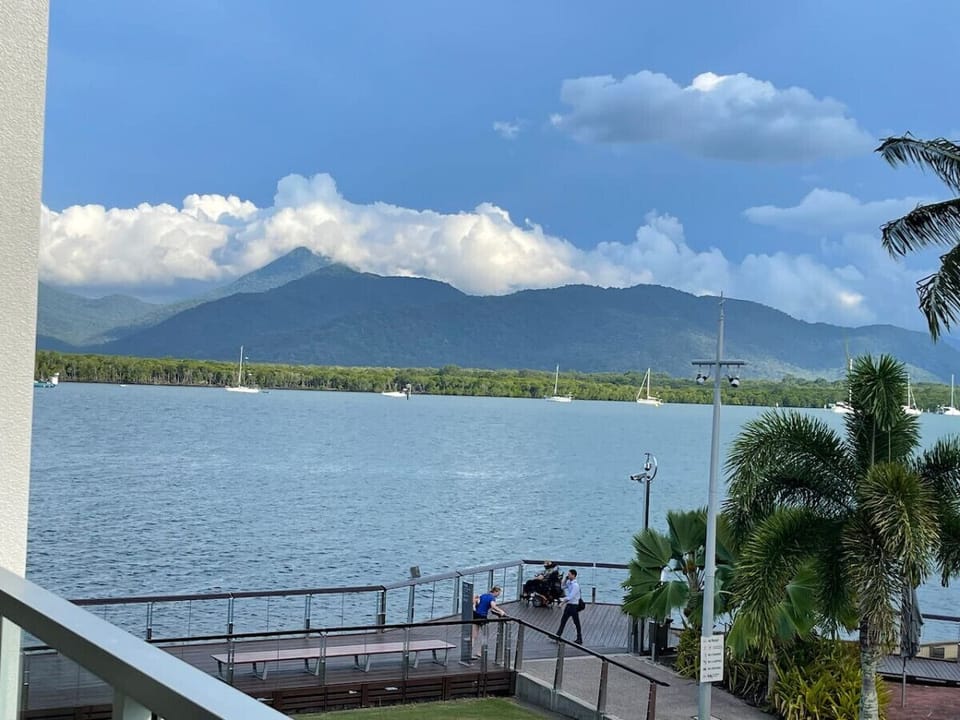 Stunning mountain and tropical scenery overlooking the water.