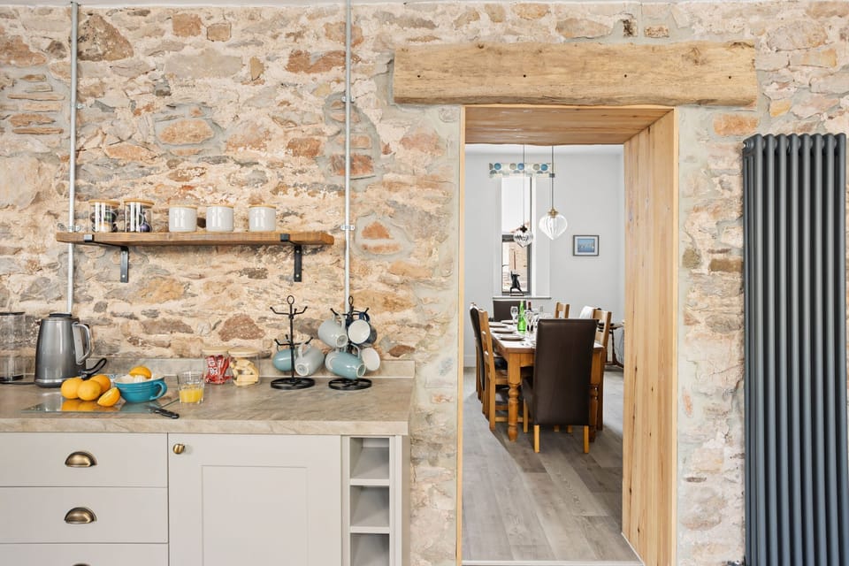 A kettle, mugs and large heater - The Linhay