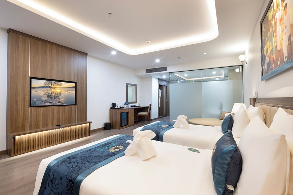 Premium bedding, free minibar items, in-room safe, desk
