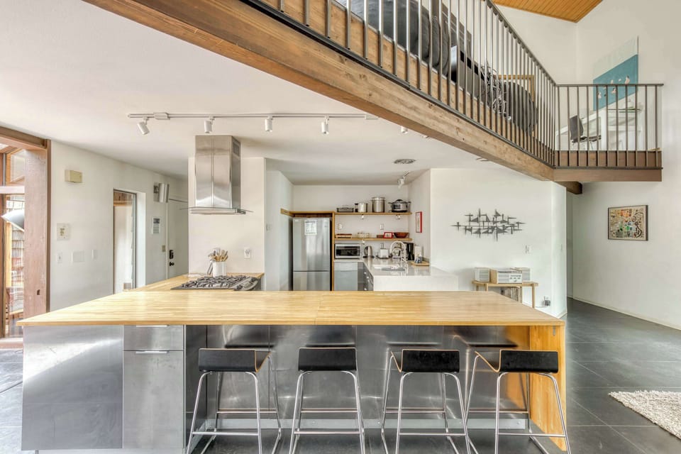 Modern kitchen hub! Perfect for sharing meals & making memories. Book your stylish escape.
