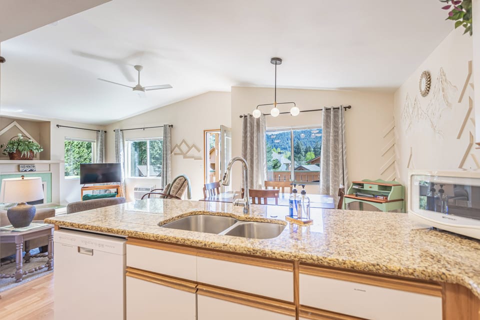 Open concept living, dining, kitchen
