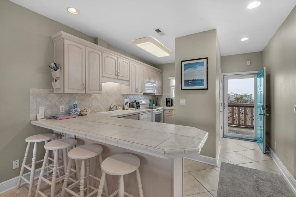 Condo, Multiple Beds (Baywatch C8) | Private kitchen | Oven, toaster, paper towels