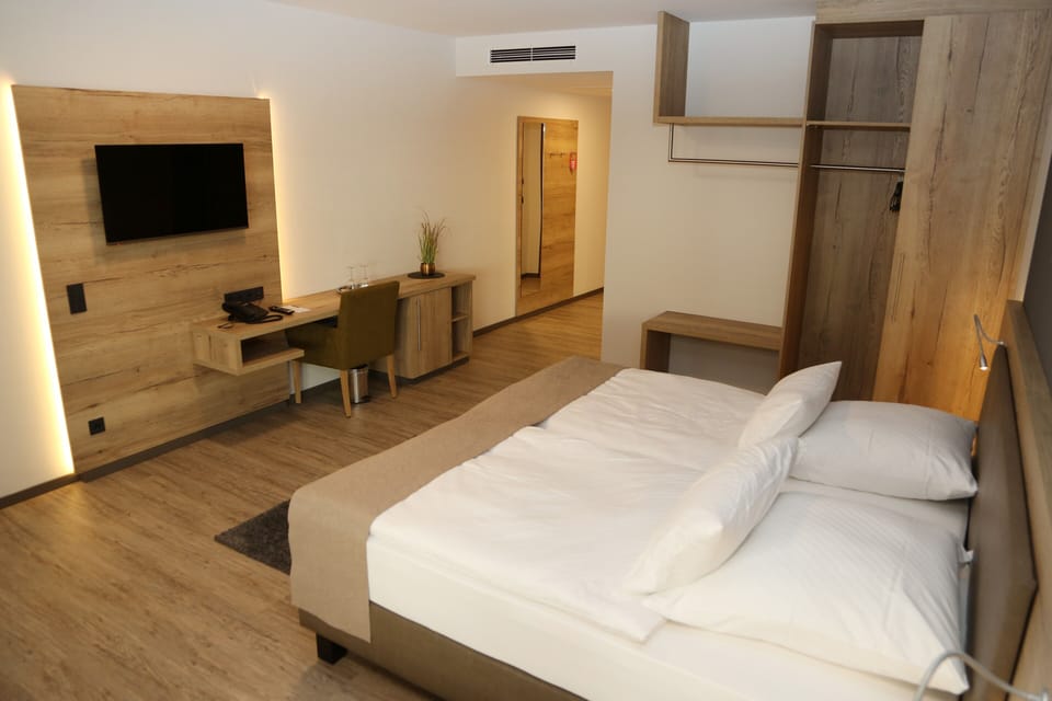 Exclusive Double Room | Desk, laptop workspace, blackout drapes, iron/ironing board