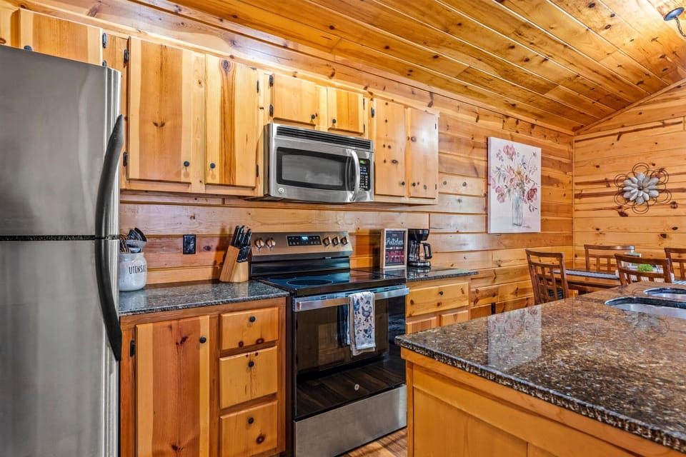 Stainless steel appliances and granite counters make whipping up a home-cooked meal a breeze.