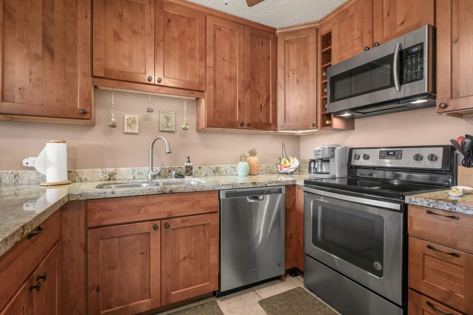 The Kitchen Has Everything To Create A Gourmet Meal - Enjoy upgraded applicances and everything you need for a feast.