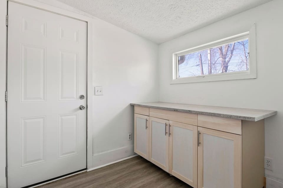 Enjoy the convenience of our in-unit laundry room, featuring modern Bosch appliances, and a folding station.