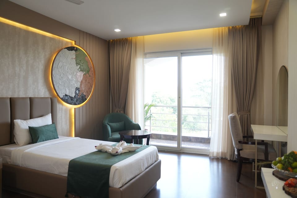 Super Deluxe Hill View Room with Balcony | Minibar, desk, laptop workspace, iron/ironing board