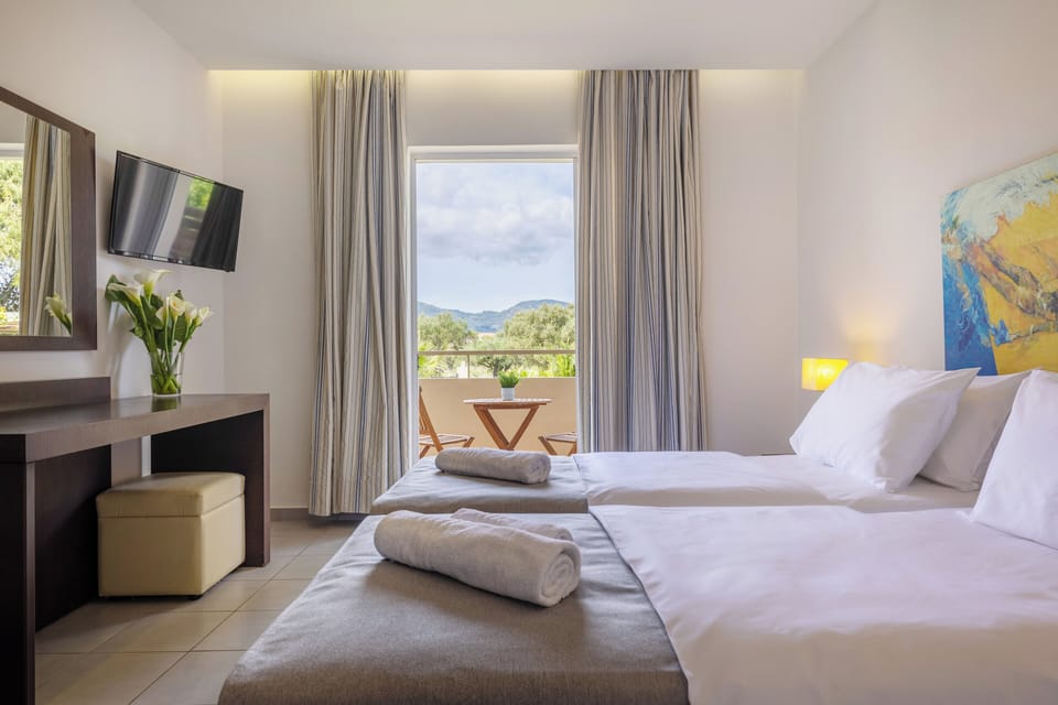 Standard Room with Garden View | Premium bedding, in-room safe, individually decorated