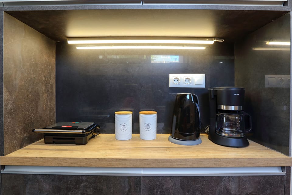 Superior Apartment | Private kitchen | Full-size fridge, coffee/tea maker, electric kettle
