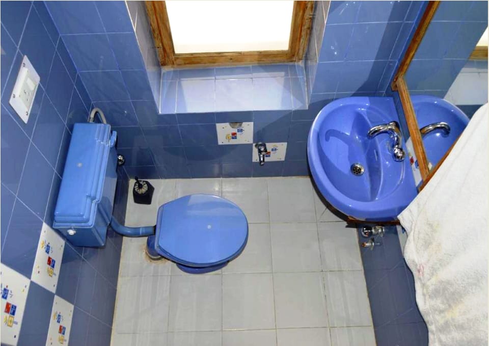 Standard Double Room | Bathroom | Shower, free toiletries, slippers, towels