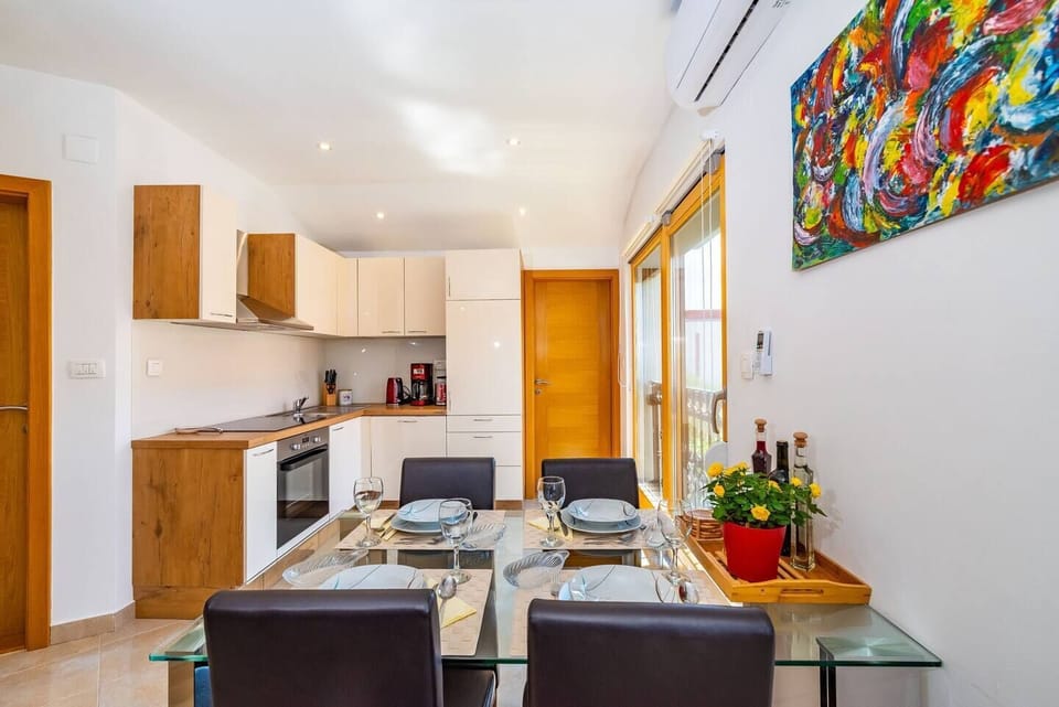 Dining area with kitchen.