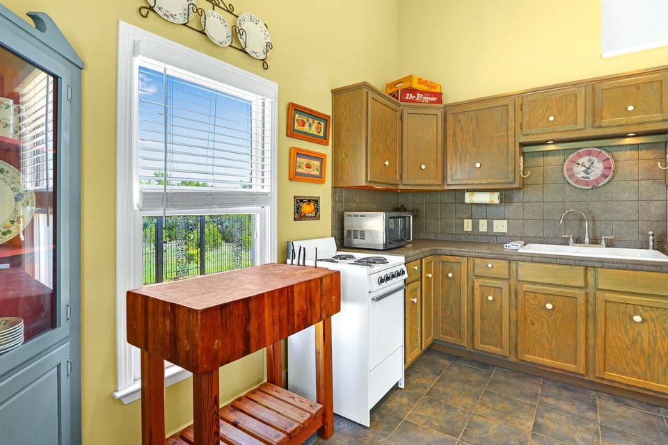 The kitchen features all the appliances needed for a homecooked meal